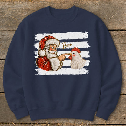 Santa booping a chicken with the word "Boop" over white stripes.