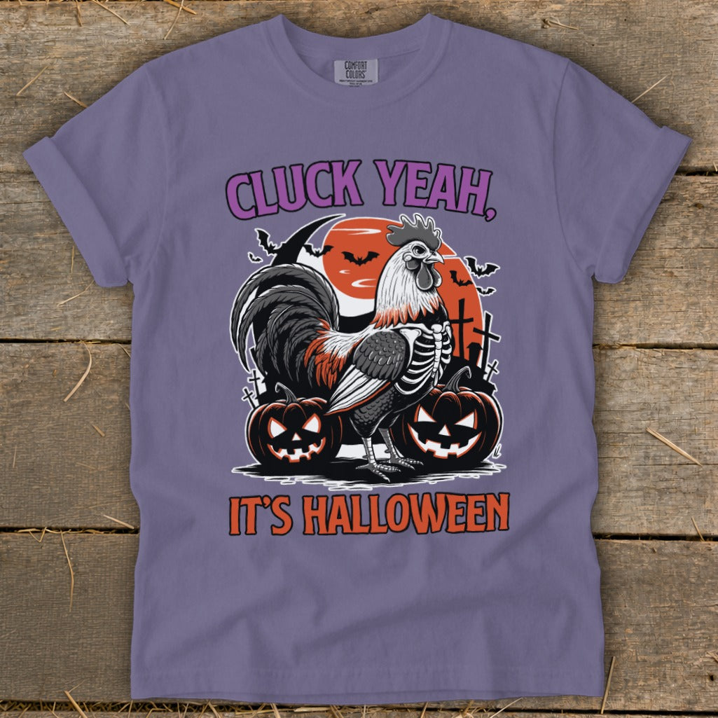 Rooster skeleton with pumpkins and text "CLUCK YEAH, IT'S HALLOWEEN".
