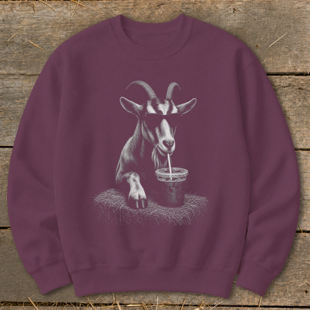 Crewneck sweatshirt with a graphic of a goat wearing sunglasses drinking from a cup.