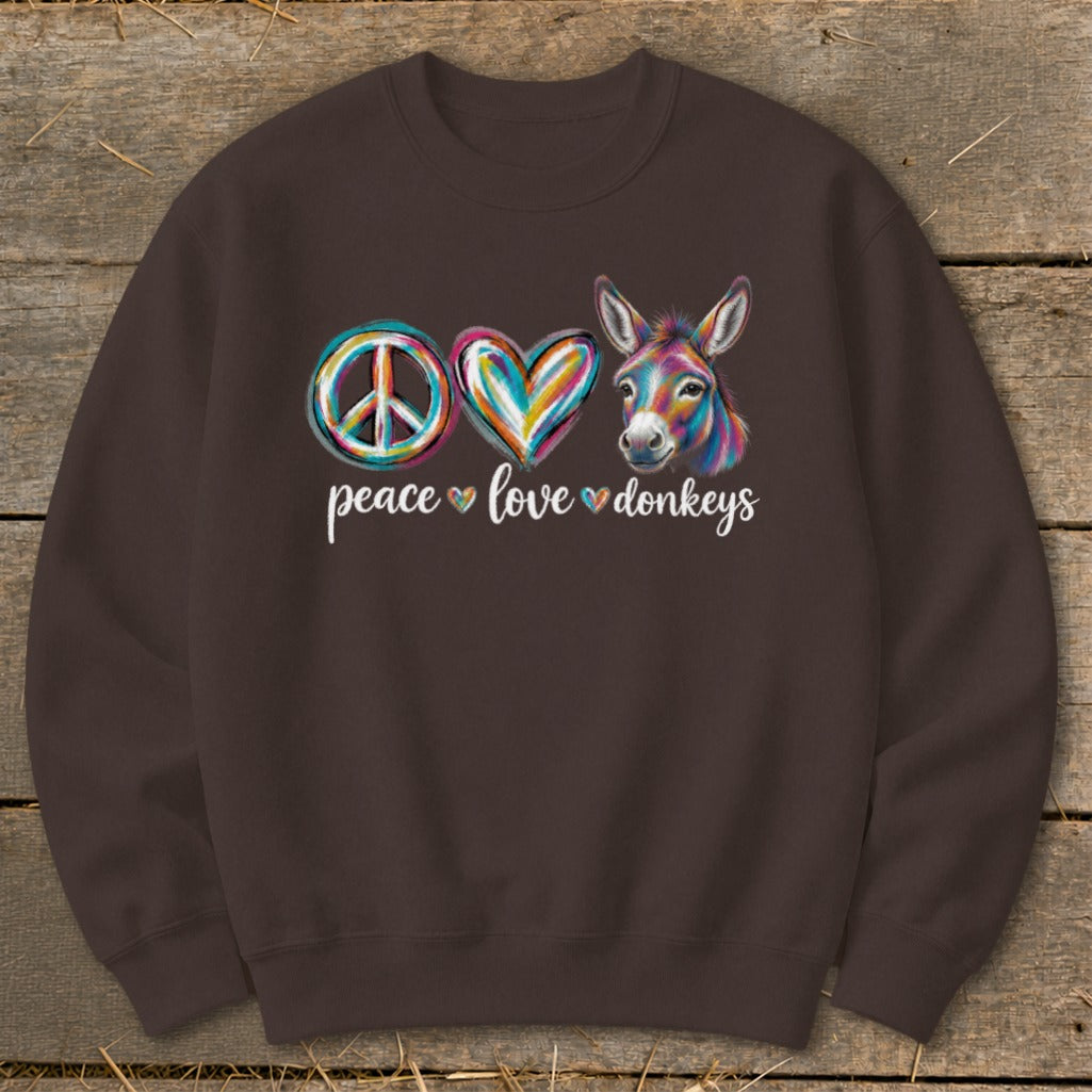 Peace, love, donkeys graphic on a brown sweatshirt.