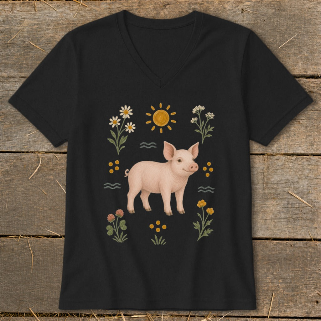 Black t-shirt with a pink pig, sun, flowers, and waves design.