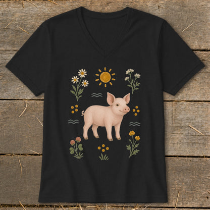 Black t-shirt with a pink pig, sun, flowers, and waves design.