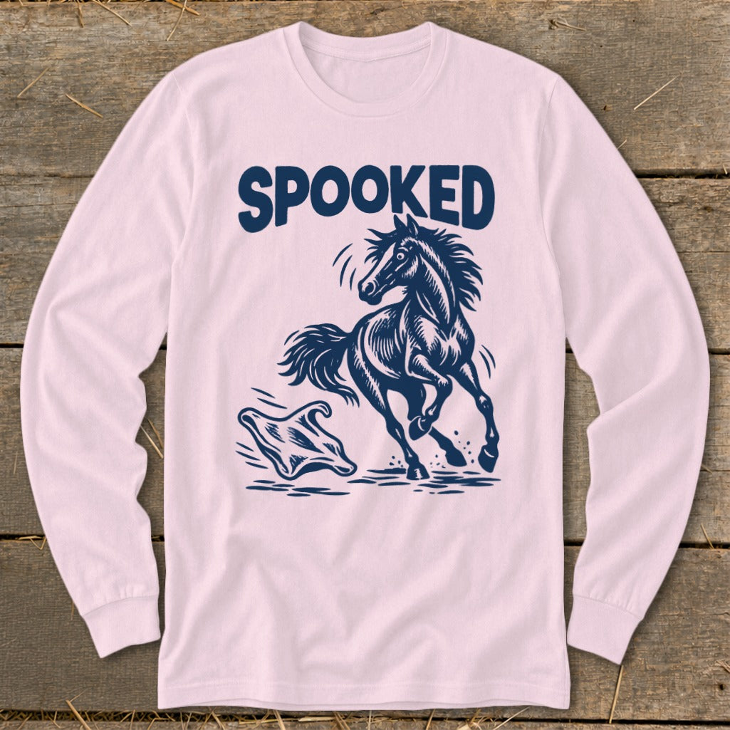 Pink long-sleeve shirt with navy blue graphic of a spooked horse and a ghost.