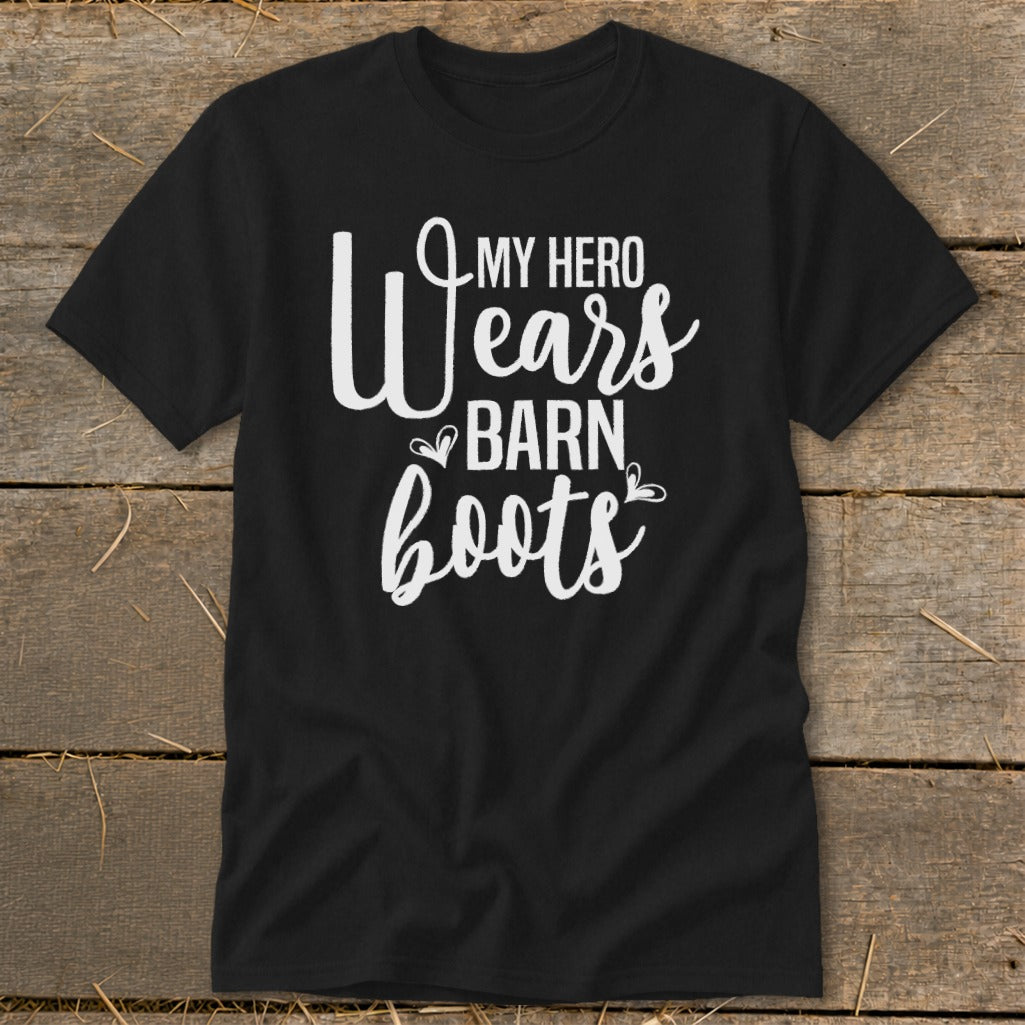 Black t-shirt with white text that reads "My Hero Wears Barn Boots".