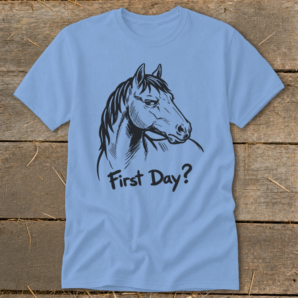 Light blue t-shirt with black line drawing of a horse's head and "First Day?" text.