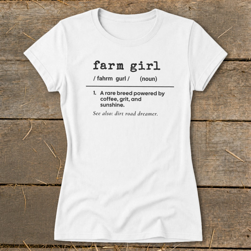 White t-shirt with "farm girl" definition: "rare breed powered by coffee, grit, and sunshine."