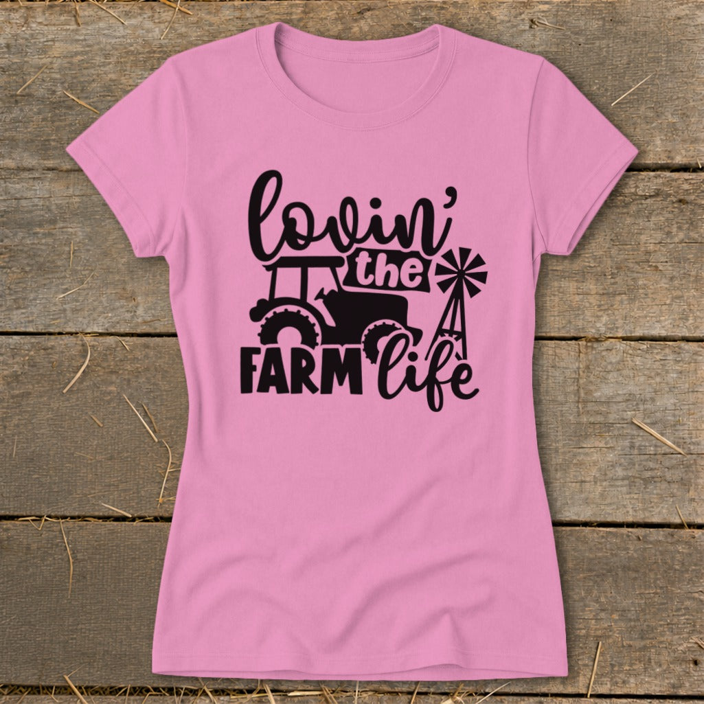 Pink t-shirt with "lovin' the FARM life" and tractor graphic.
