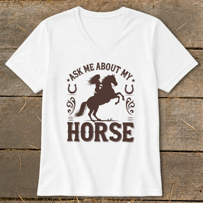 White v-neck t-shirt with dark brown graphic: "Ask Me About My Horse" with rider and horse silhouette.