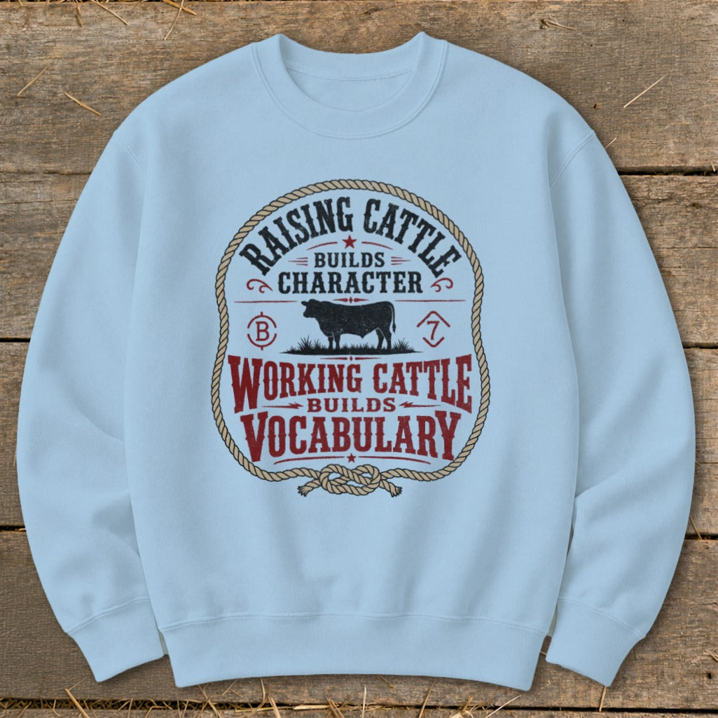 Light blue sweatshirt with "Raising Cattle Builds Character" and "Working Cattle Builds Vocabulary" text.