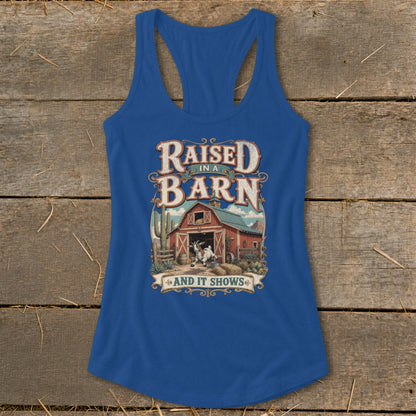 Blue tank top with "Raised in a Barn and It Shows" text and barn graphic.