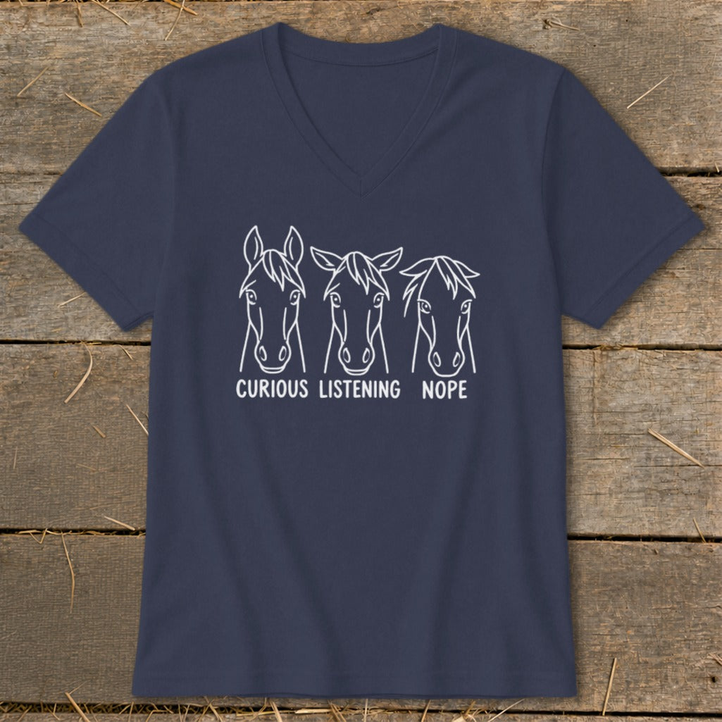A dark blue V-neck t-shirt with a white horse graphic and the text CURIOUS LISTENING NOPE.