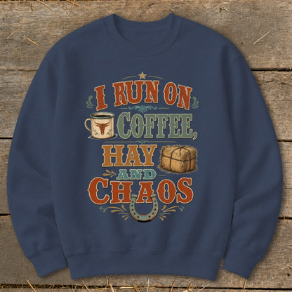 Crewneck sweatshirt with "I Run on Coffee, Hay and Chaos" text and graphics.