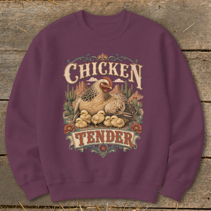 Crimson sweatshirt with "Chicken Tender" graphic featuring hen and chicks in a desert landscape.