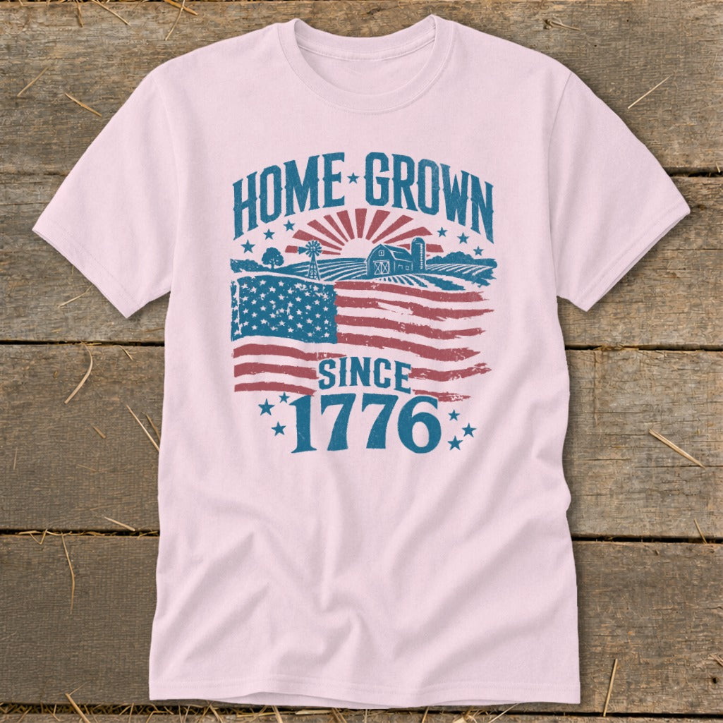 Pink t-shirt with "HOME GROWN SINCE 1776" text and American flag farm graphic.