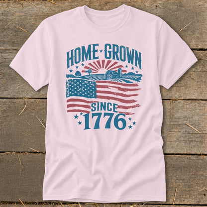 Pink t-shirt with "HOME GROWN SINCE 1776" text and American flag farm graphic.