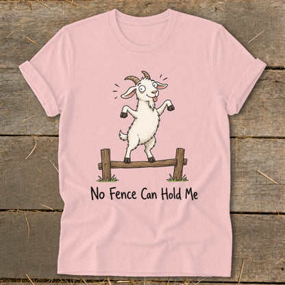 Pink t-shirt with a cartoon goat standing on a fence with the text "No Fence Can Hold Me".