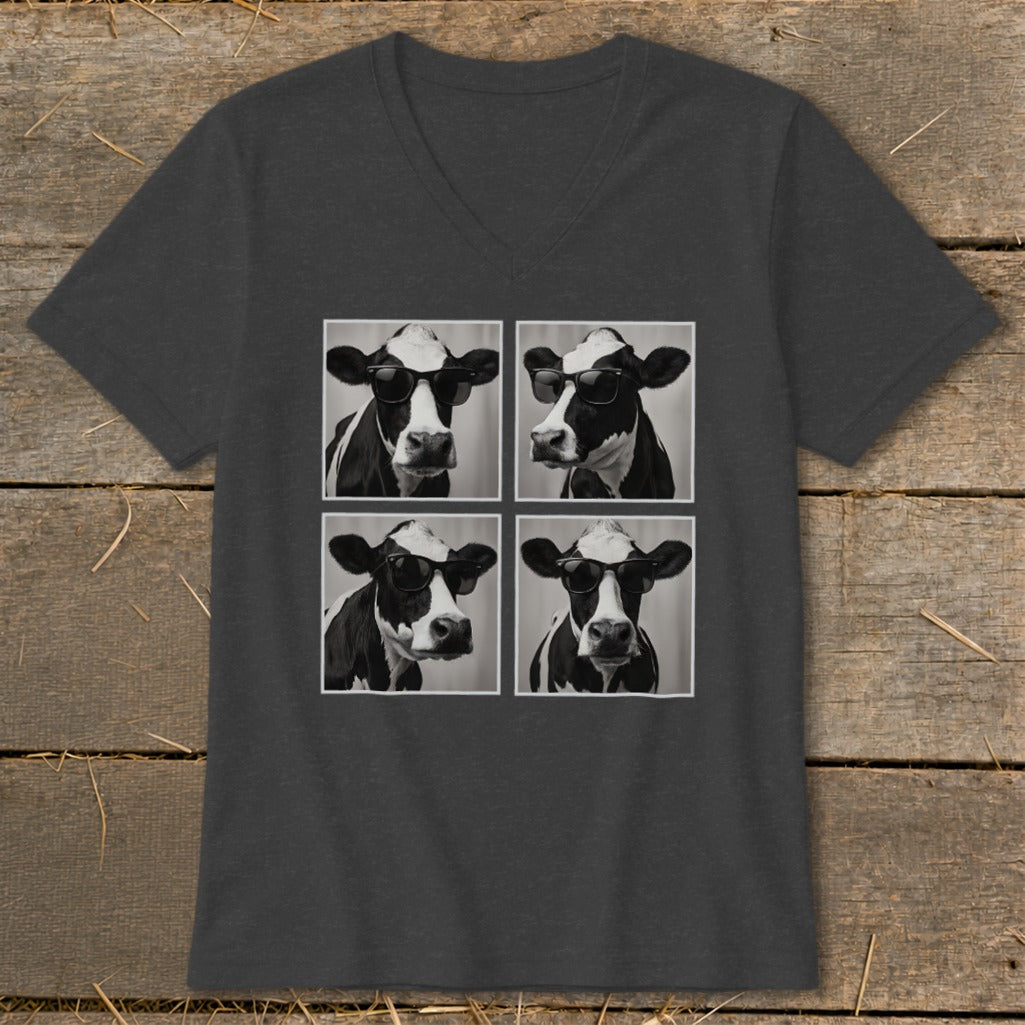 Four black and white cows wearing sunglasses in a grid layout on a t-shirt.