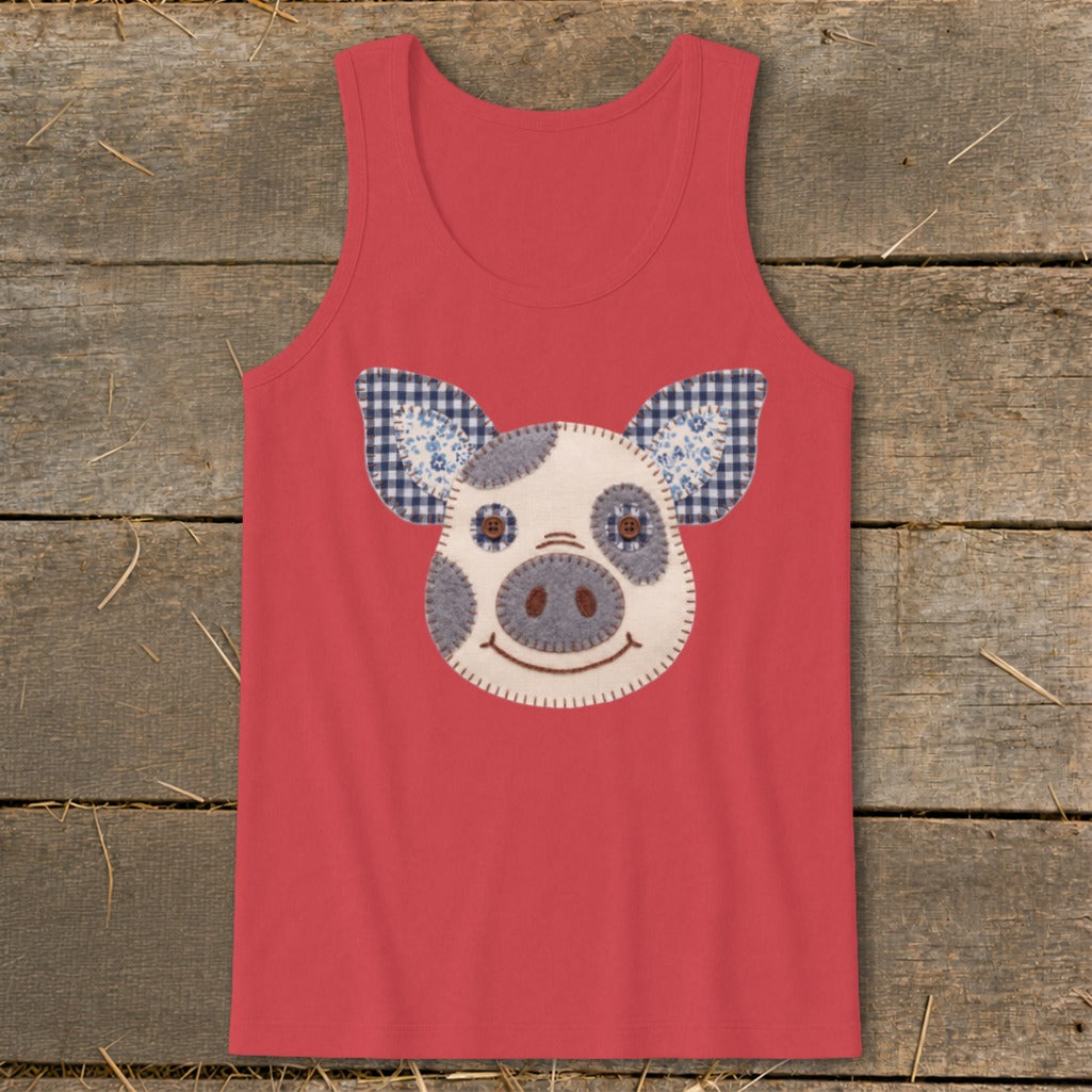 Red tank top with a patchwork pig face appliqué.