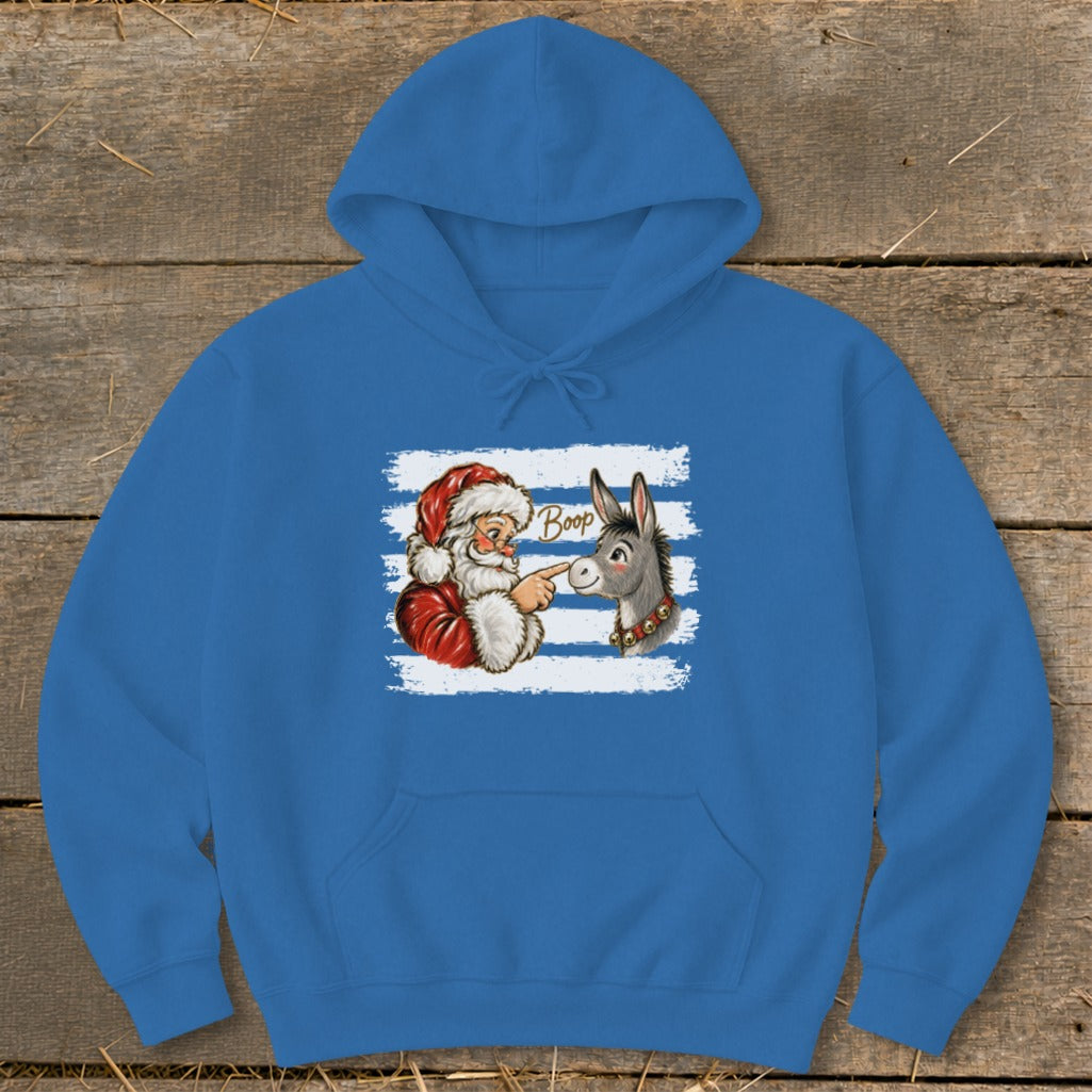 Santa boops a donkey's nose with the word "Boop" above.