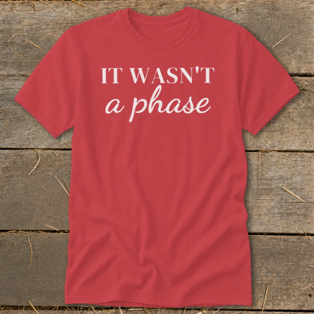 Red t-shirt with white text that reads "IT WASN'T a phase".