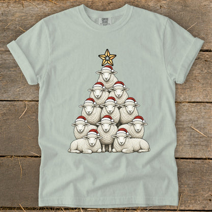 Sheep arranged in a Christmas tree shape, wearing Santa hats, topped with a star.