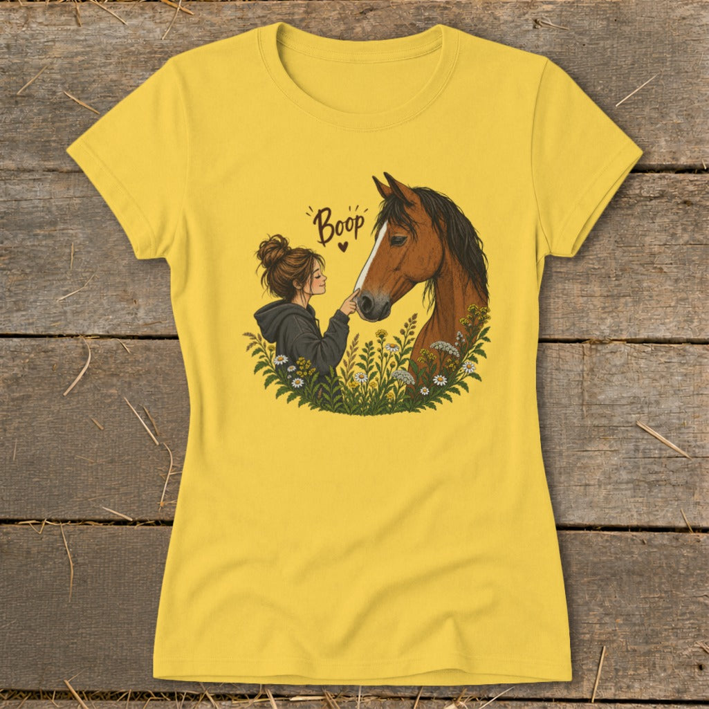Illustration of a girl touching a horse's nose, with "Boop" text.
