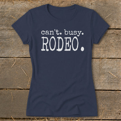 Navy t-shirt with white text "can't. busy. RODEO."