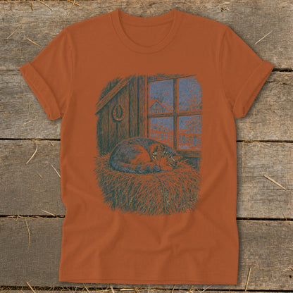 T-shirt with a cat sleeping on straw in front of a barn window.