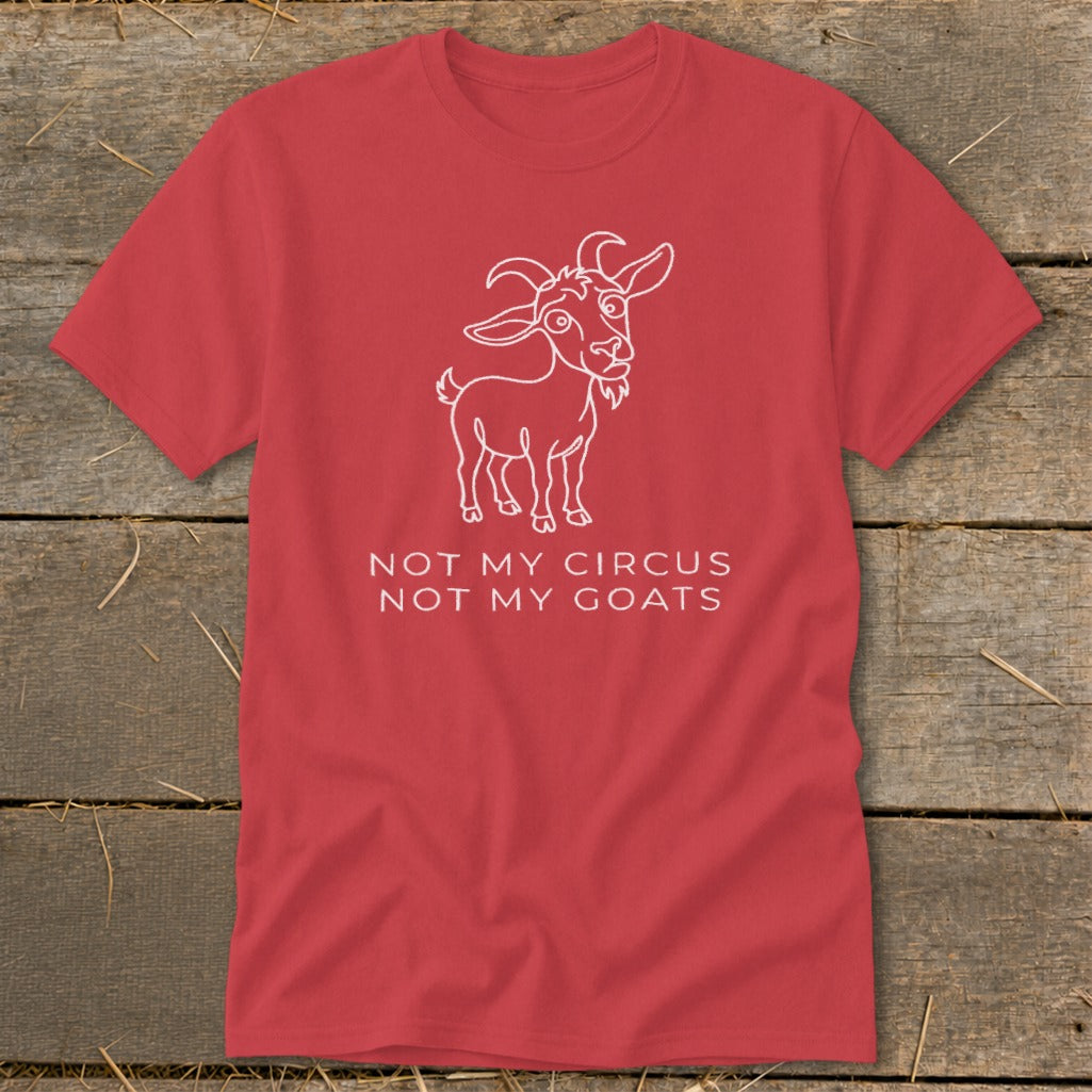 Red t-shirt with white outline of a goat and text "NOT MY CIRCUS NOT MY GOATS".