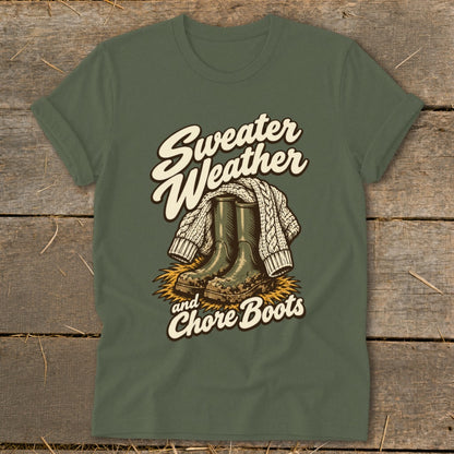 Green t-shirt with "Sweater Weather and Chore Boots" text and illustration.