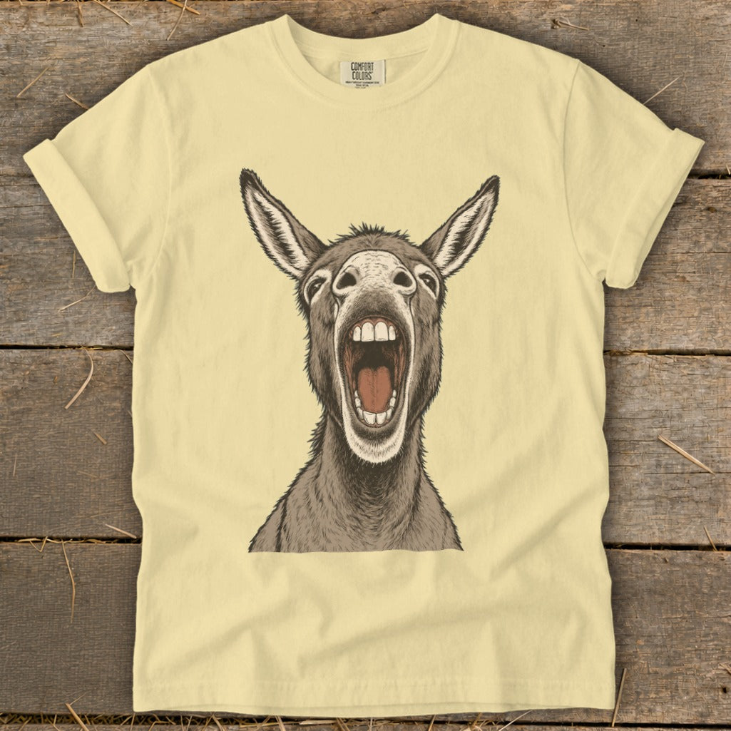 Yellow t-shirt with a cartoon donkey's head roaring with mouth open.