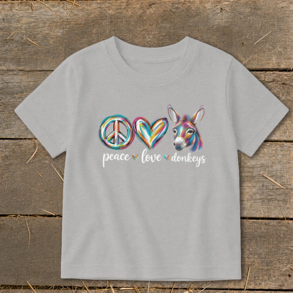 Grey t-shirt with a peace sign, colorful heart, and donkey graphic with text "peace love donkeys".