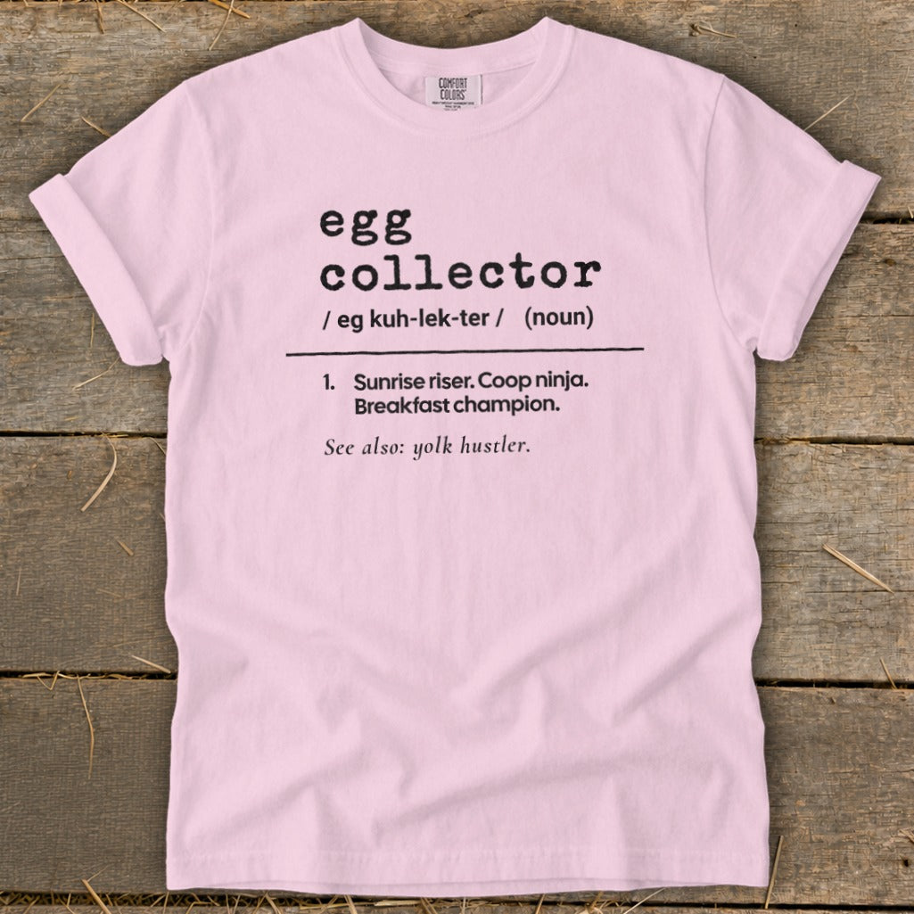 Pink t-shirt with "egg collector" definition and "yolk hustler" text.