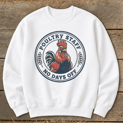 White sweatshirt with a circular logo featuring a rooster and text "POULTRY STAFF NO DAYS OFF."