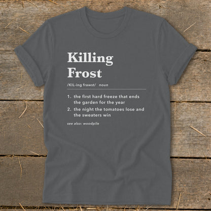 Dark gray t-shirt with white dictionary-style text defining Killing Frost on a rustic wooden background.