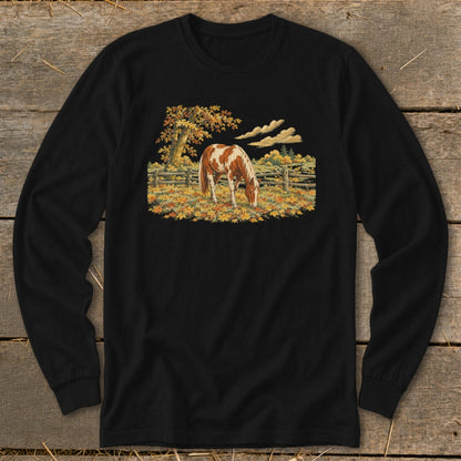 Black long-sleeve shirt with a painted horse in a fall meadow scene.
