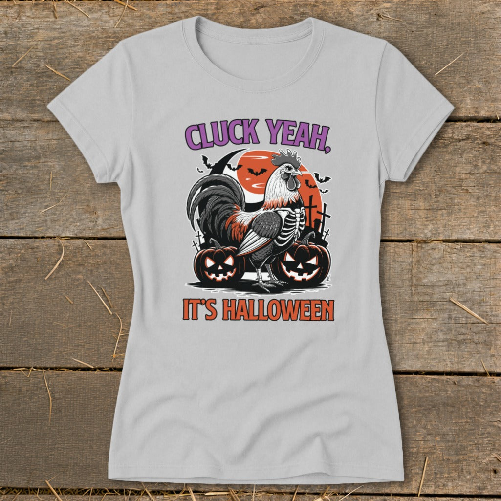 Skeleton rooster with pumpkins and text "Cluck Yeah, It's Halloween".