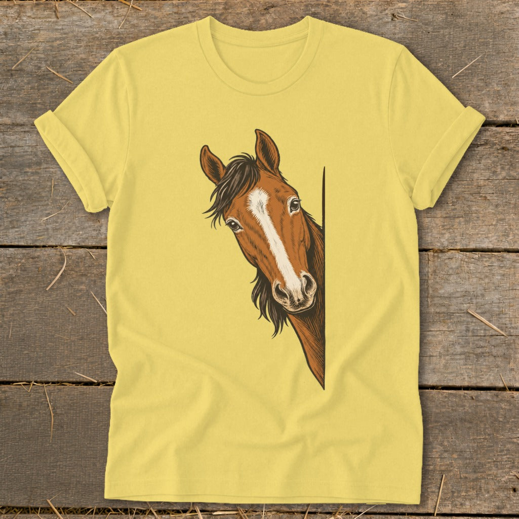Yellow t-shirt with a brown horse peeking around a corner illustration.