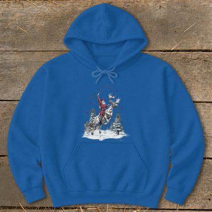 Blue hoodie with Santa riding a reindeer in a snowy forest.