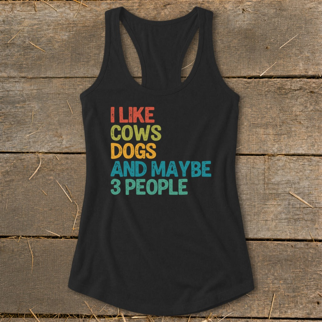 Black tank top with "I like cows, dogs, and maybe 3 people" text.