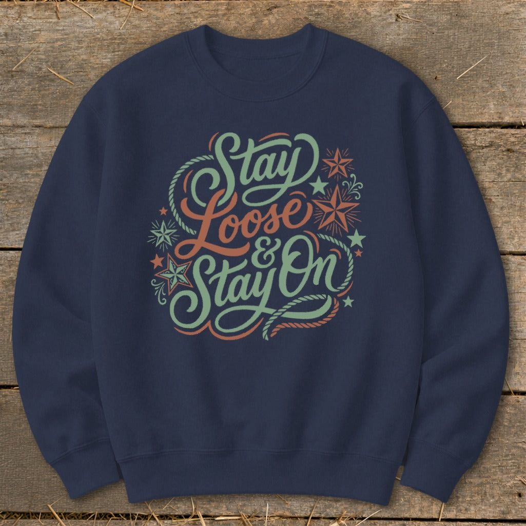 Navy sweatshirt with "Stay Loose & Stay On" text and rope graphics.