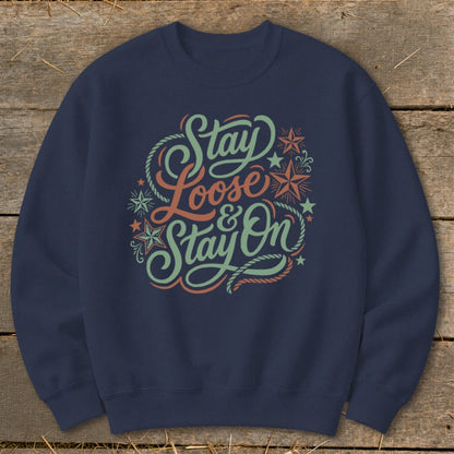 Navy sweatshirt with "Stay Loose & Stay On" text and rope graphics.