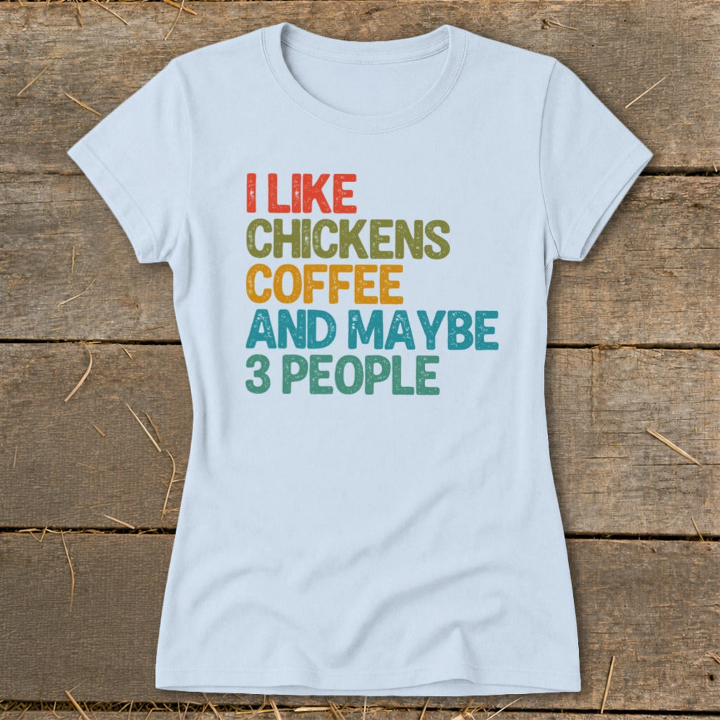 Light blue t-shirt with "I like chickens, coffee and maybe 3 people" text.