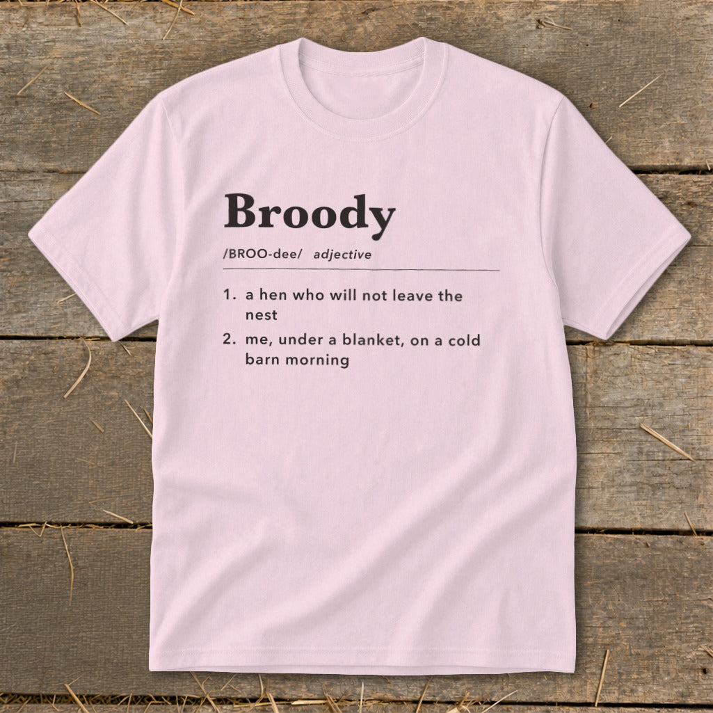 Pink t-shirt with "Broody" definition: a hen or me under a blanket.