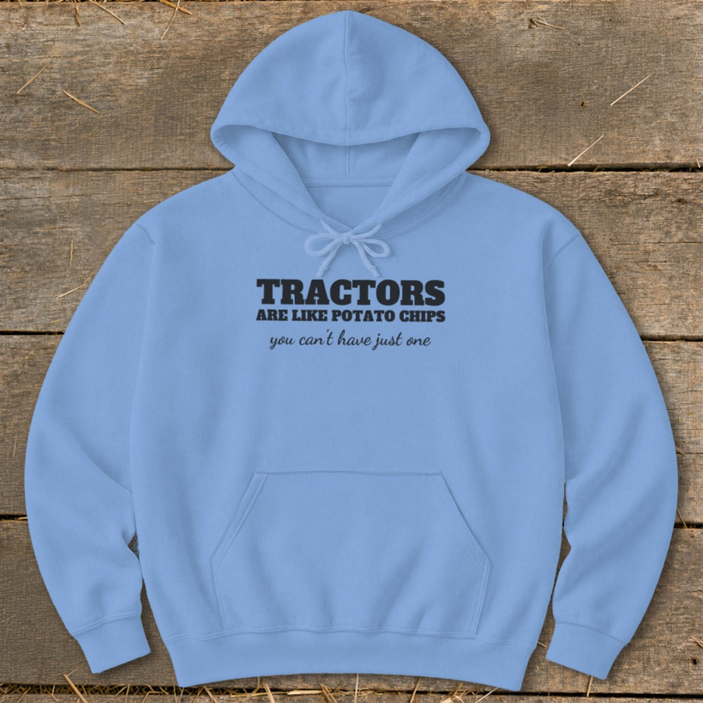 Light blue hoodie with black text that reads "TRACTORS ARE LIKE POTATO CHIPS you can't have just one."