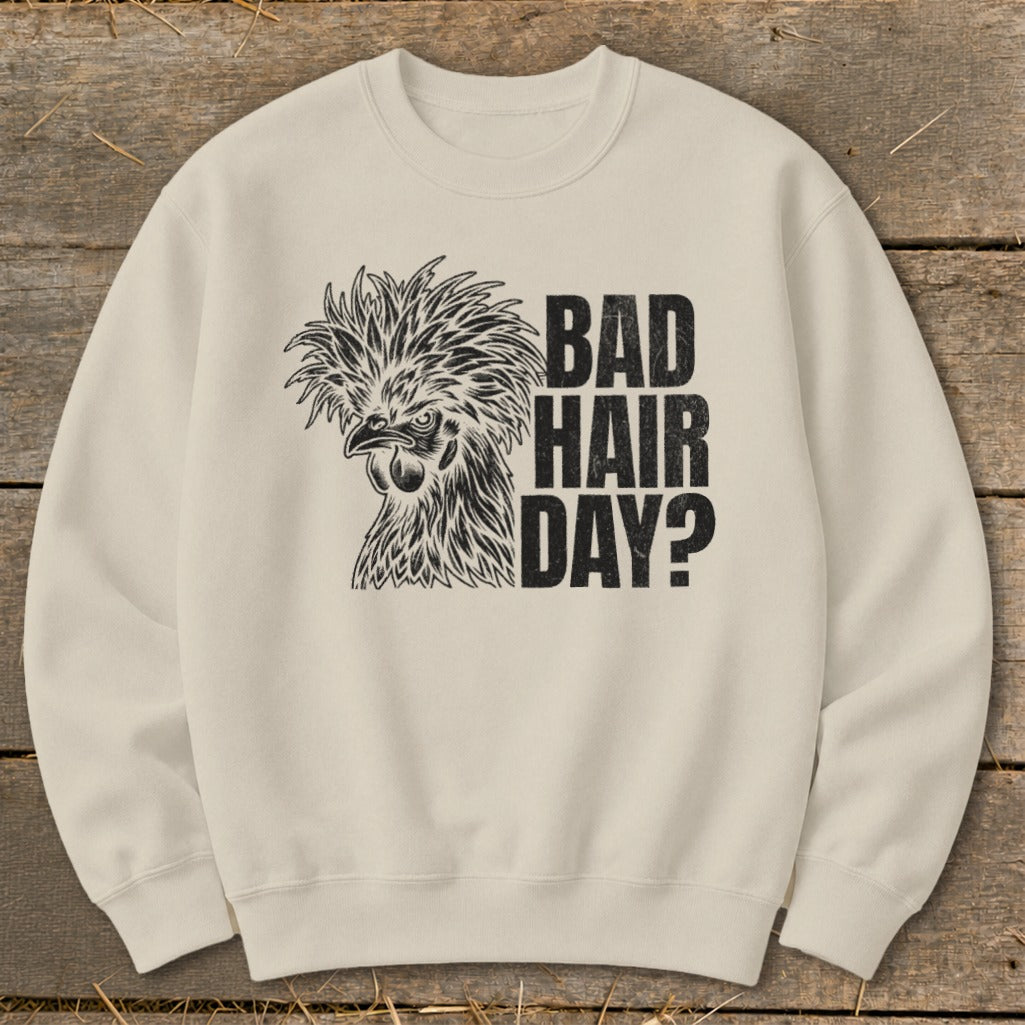 Cream sweatshirt with black graphic of a chicken and text "BAD HAIR DAY?".