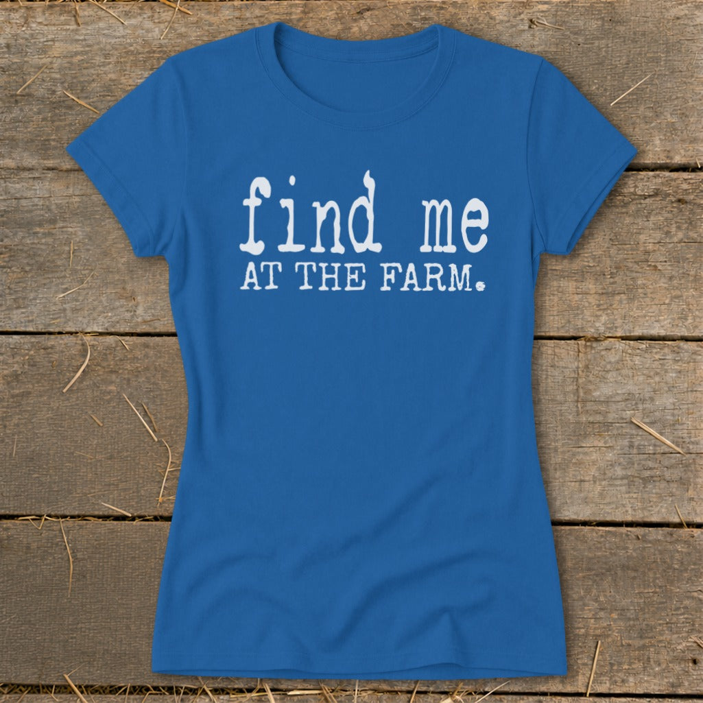 Blue t-shirt with white text that reads "find me AT THE FARM."