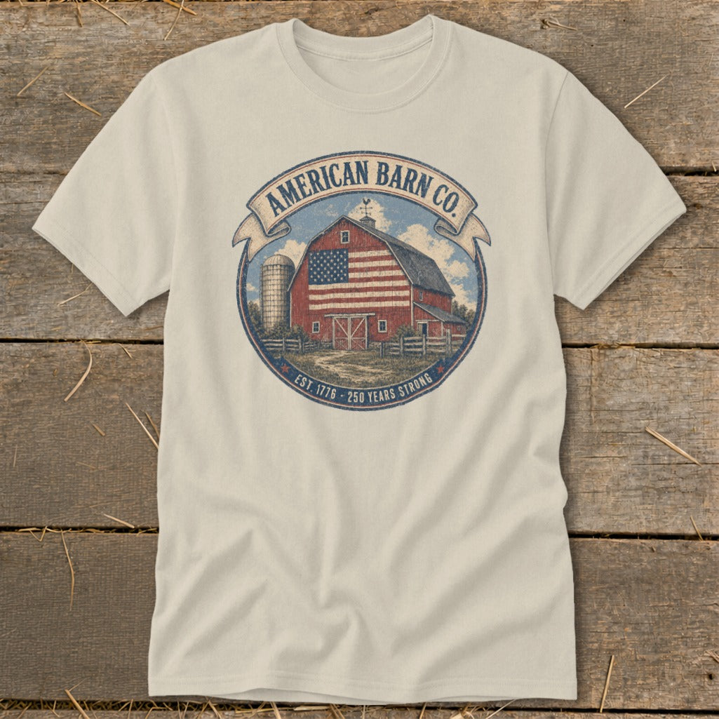 T-shirt with American Barn Co. logo: red barn with US flag, silo, fence, and text.