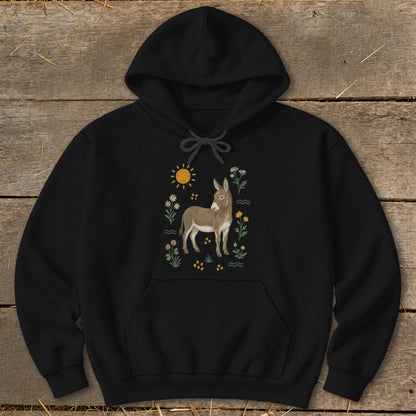 Black hoodie with a tan donkey and floral design with a sun.