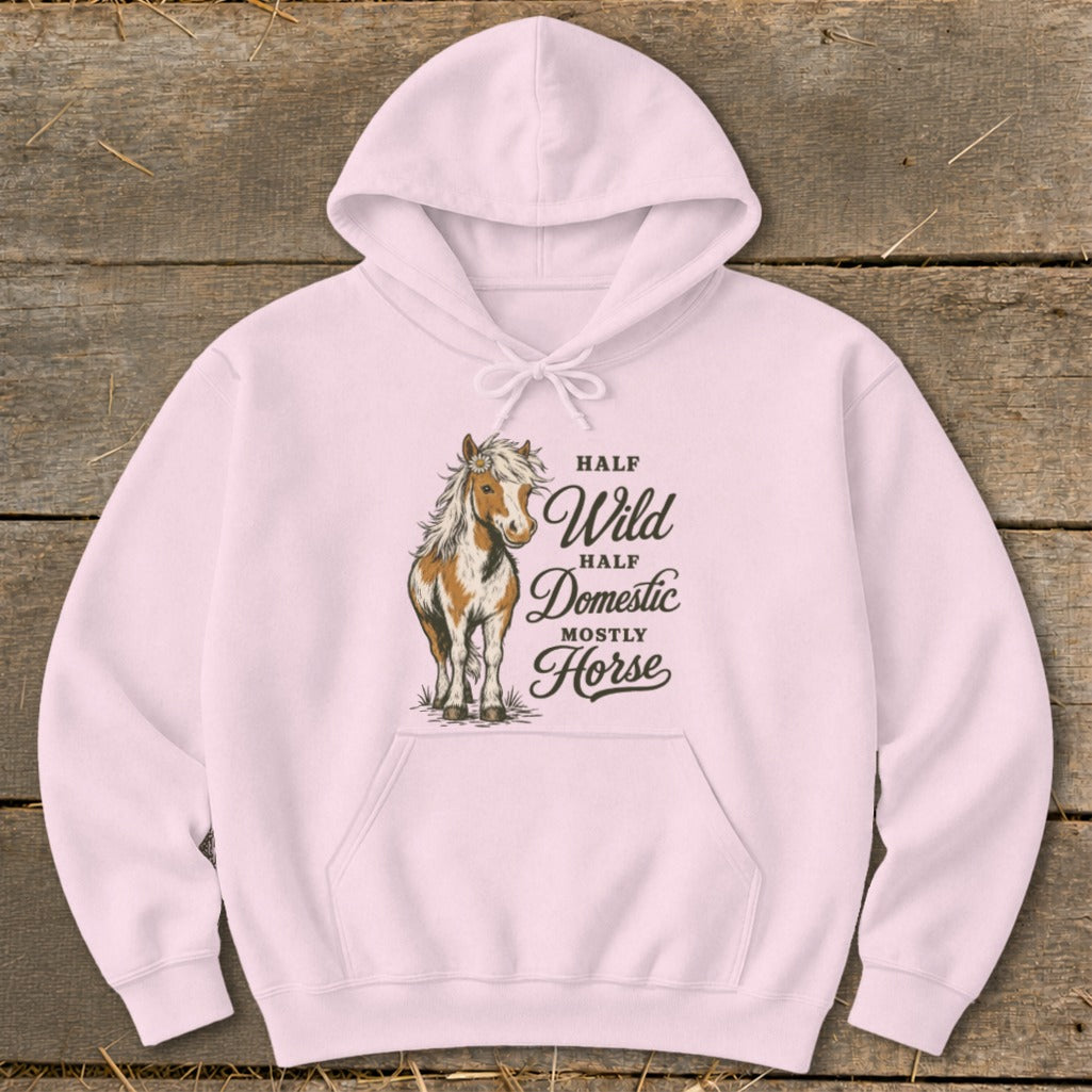 Pink hoodie with a brown and white horse graphic and text "Half Wild Half Domestic Mostly Horse".